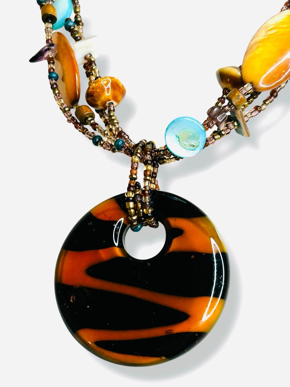 Vintage Multi Strand Glass Beaded
Necklace Tiger Stripe Donut Pendant
Boho